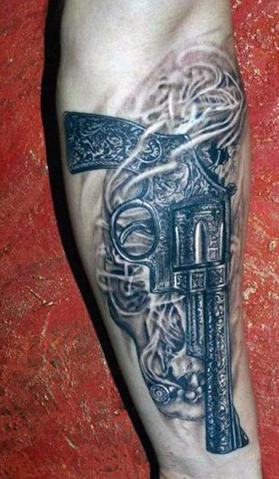 tatuagem pistola 34